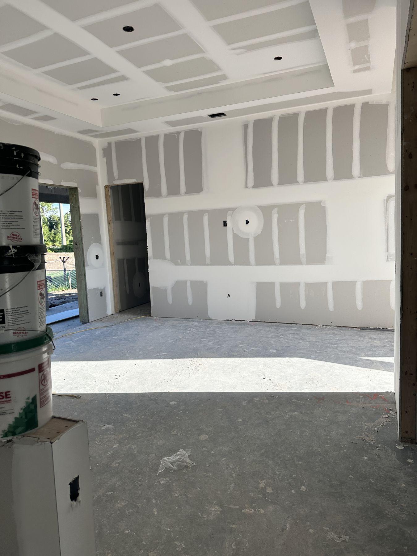 Hung and taped drywall inside a new home