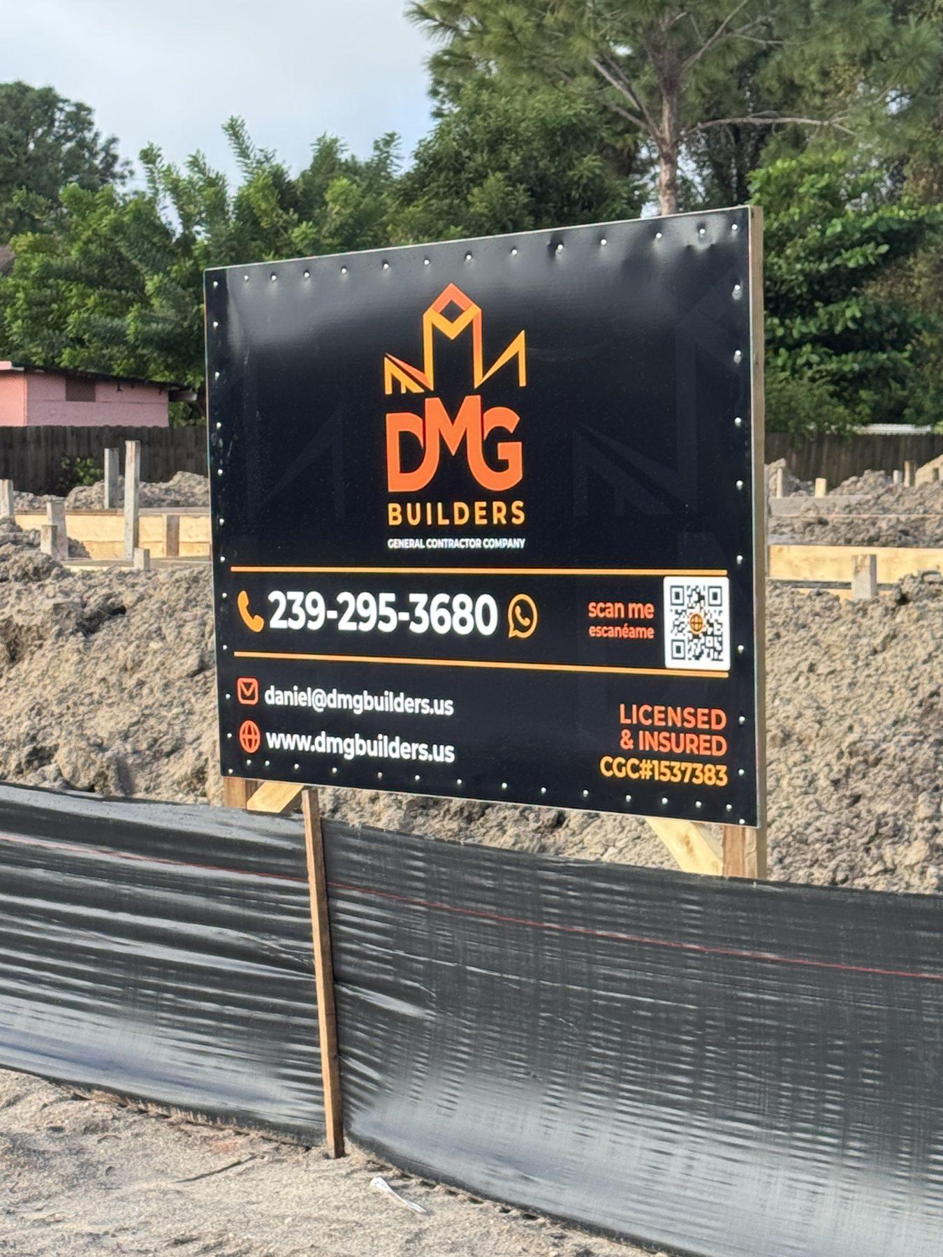 DMG Builders permit sign posted on a job site