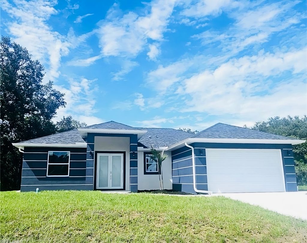Coastal-style home with blue and white exterior built in Southwest Florida